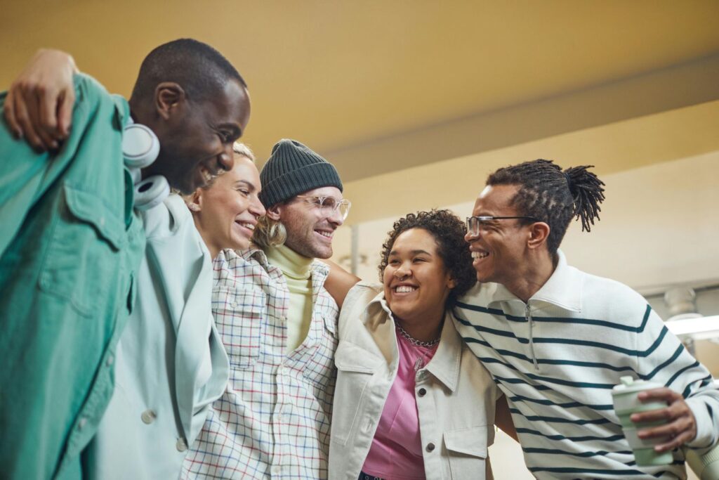 Happy group of friends shopping together at a friendly and welcoming kratom shop Tulsa community.