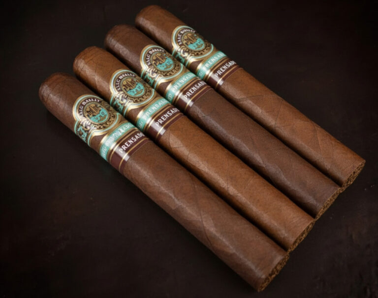 Premium Alec Bradley Prensado cigars on display at a cigar shop Tulsa, featuring rich wrappers and ornate bands.
