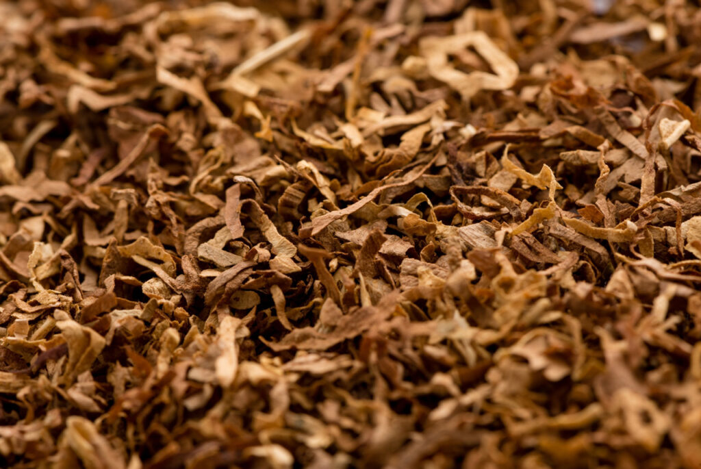 High quality premium loose leaf tobacco at a tobacco shop Tulsa OK featuring natural golden shredded leaves for rolling.