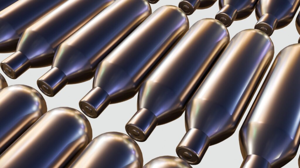 High quality bronze metallic nitrous oxide Tulsa industrial canisters arranged in a pattern for commercial supply.