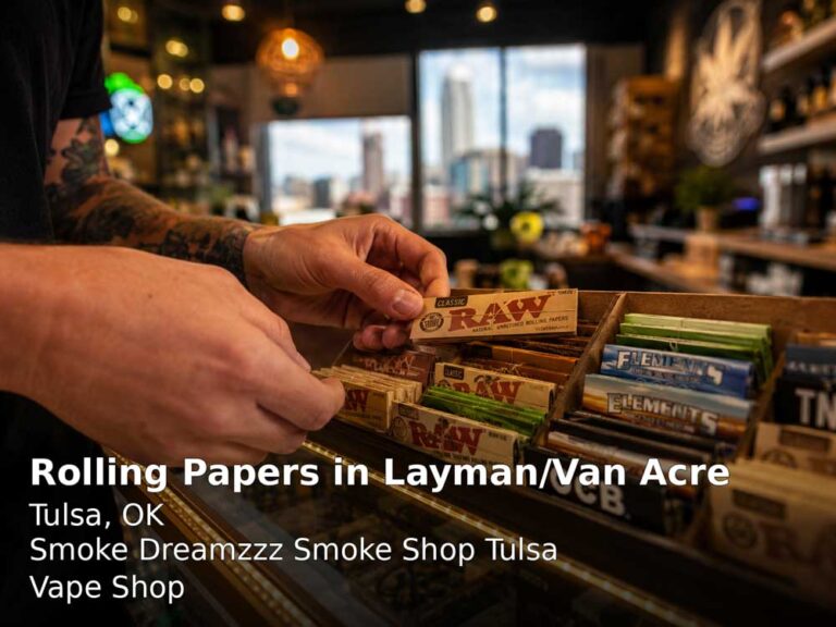 Customer browsing premium RAW rolling papers Tulsa inside Smoke Dreamzzz shop display counter in Layman Van Acre.
