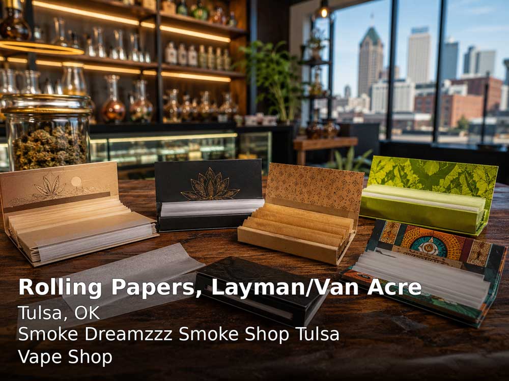 Variety of open packs of organic rolling papers Tulsa resting on wooden counter in Smoke Dreamzzz vape store.