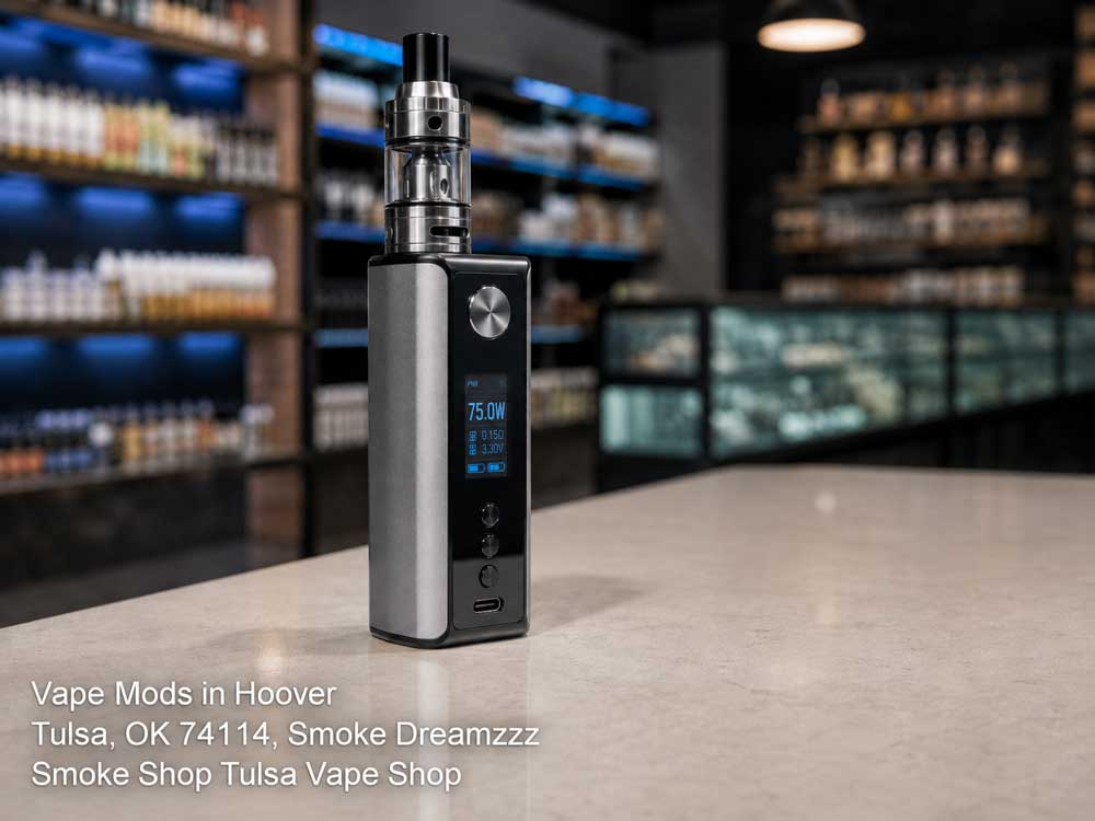 Silver and black vape mods Tulsa store product close-up displaying an active screen on a well-lit showroom counter.